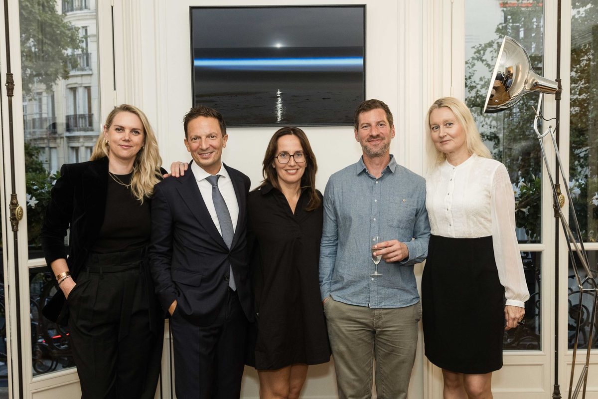 Photographer Matthieu Malaud with the organisers of the opening