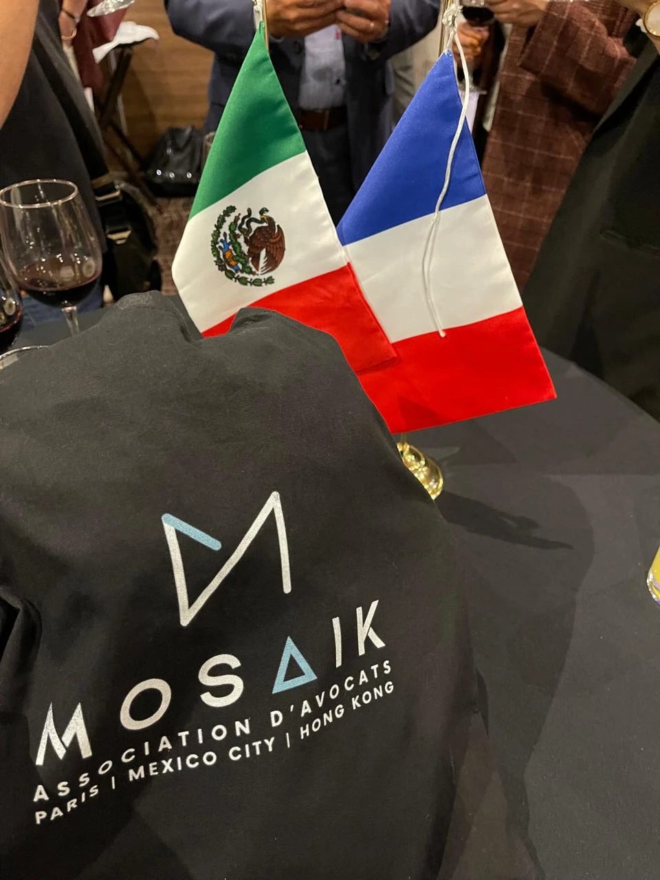 Mexican and French flags at a France-Mexico business gathering